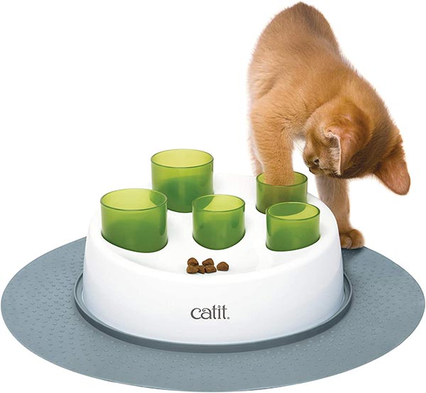 Photo of Catit Senses 2 Digger showing cat with its paw inside green tube